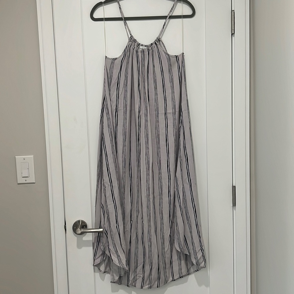 Carly Jean Flowy Midi Dress with Pockets